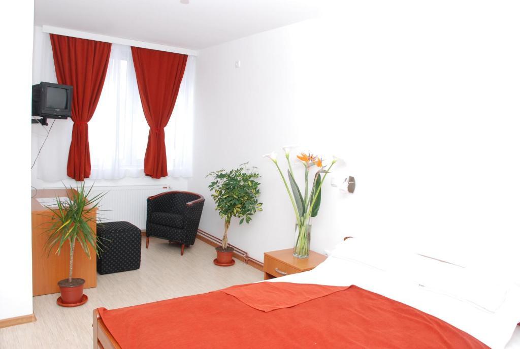 M Garni Hotel Vranje Pokoj fotografie
